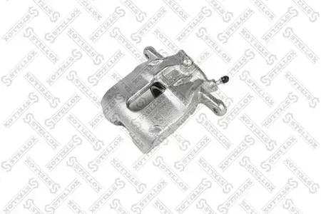 STELLOX 0590452SX Суппорт торм.пер.лев. Nissan Micra C+C Micra III Note 1.2-1.61.5D 03>
